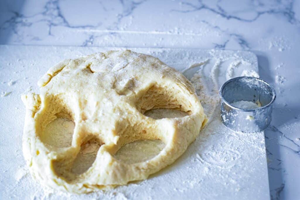dough with rounds cut out
