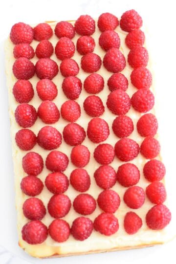 Raspberry white chocolate cheesecake slice