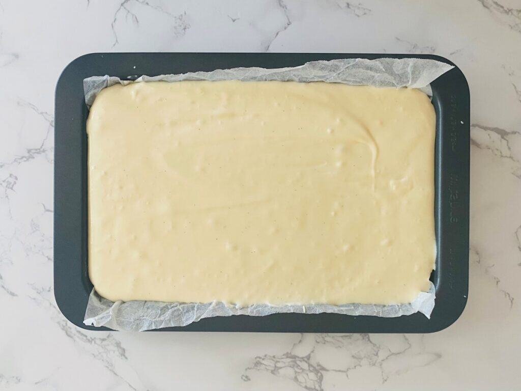 raspberry white chocolate cheesecake slice ready for the oven