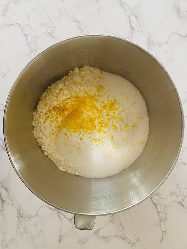 Dry ingredients in stand mixer bowl for Lemon & Blackberry Sandwich Cake 