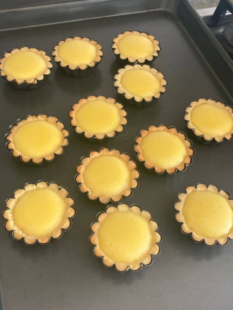 Baked lemon tartlets on a tray