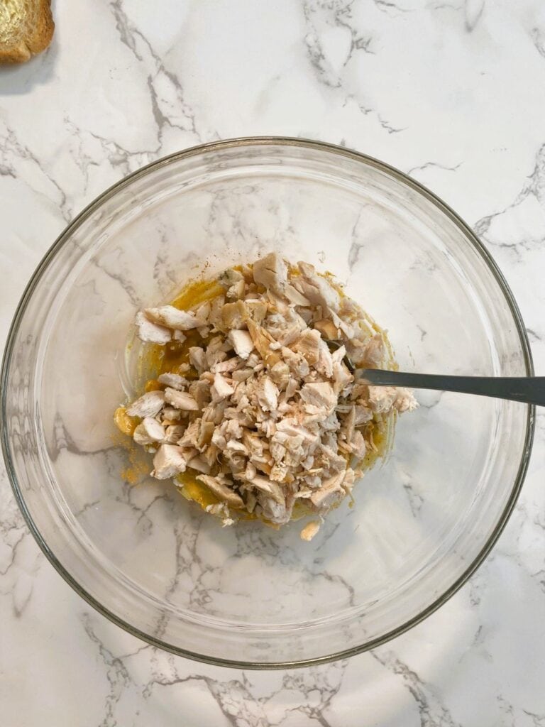 Coronation chicken finger sandwiches mixture in a bowl