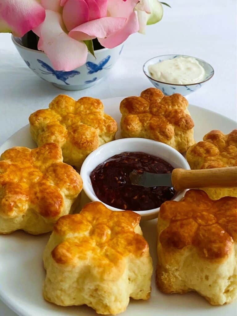flower scones with roses, jam and cream