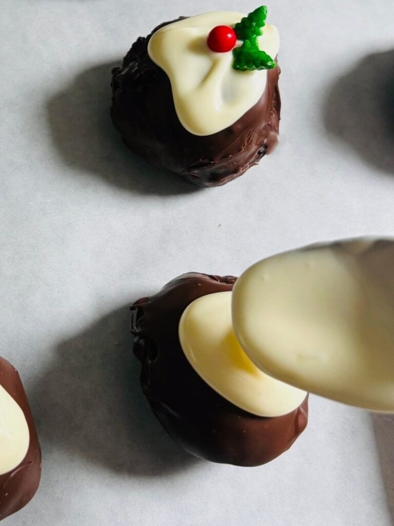 Add the white chocolate to Little Christmas Pudding Truffles