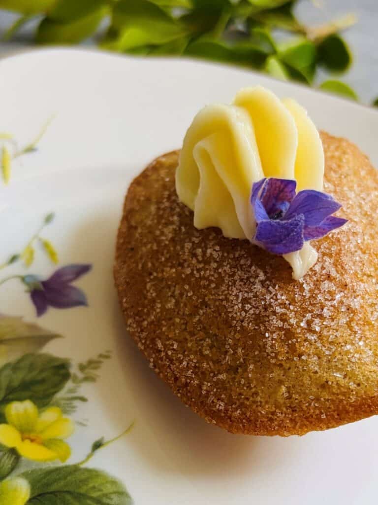 Cinnamon roll madeleines on a plate
