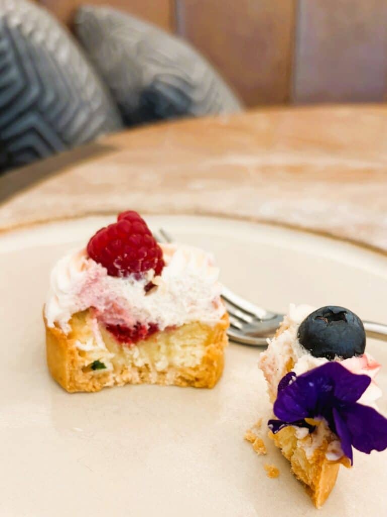 A single frangipani tart on a plate 