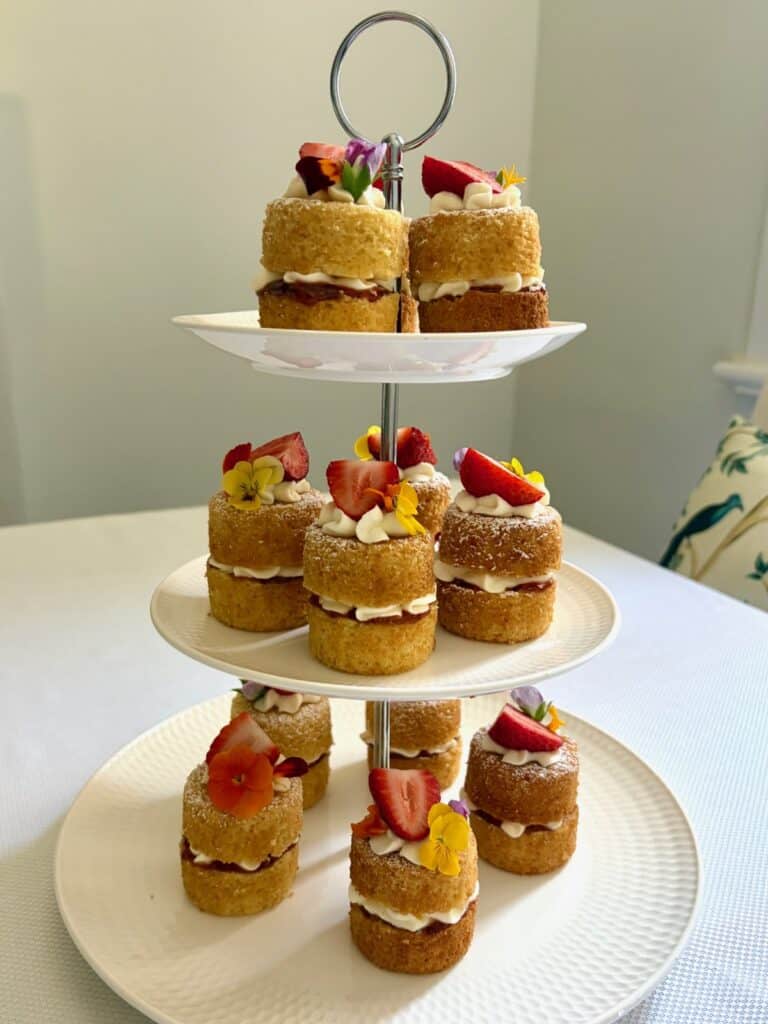 easy mini victoria sponge cakes on a stand