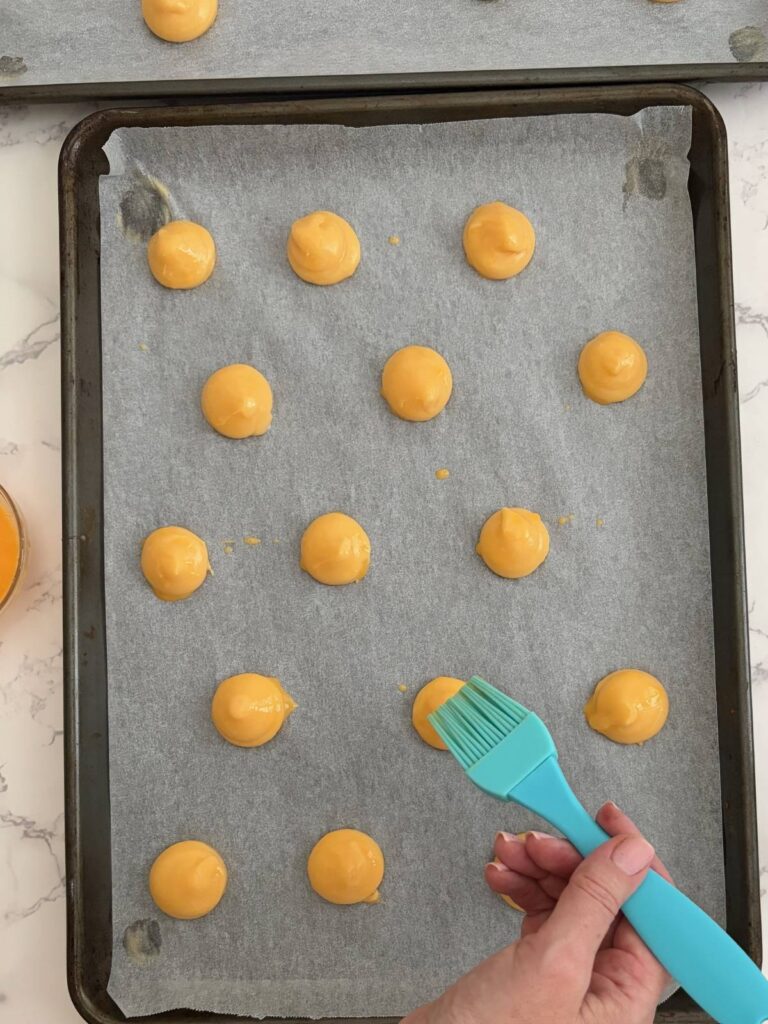 choux piped on a tray 
