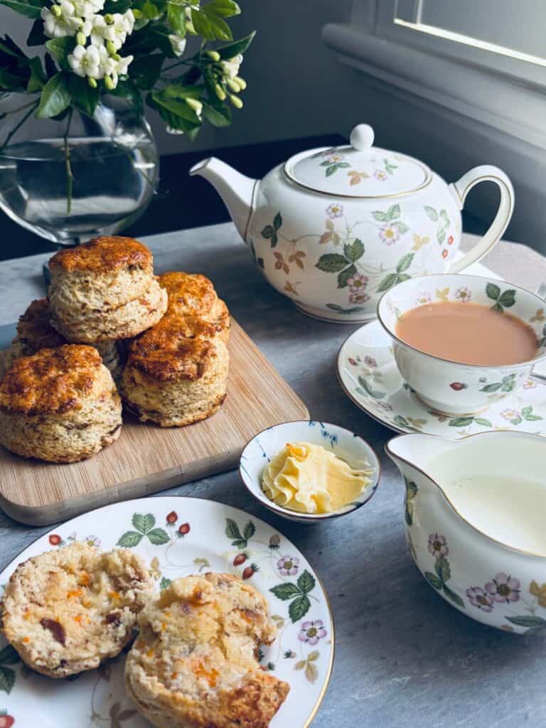 Orange & Date scones with whipped honey butter with a tea set