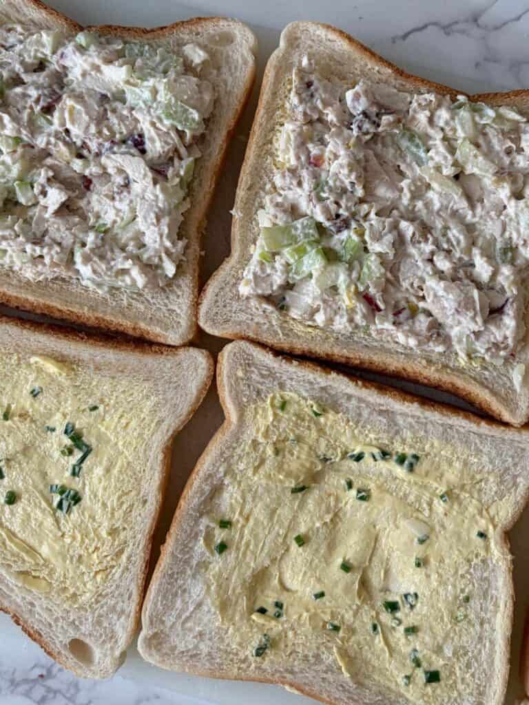 Mixture spread on chive buttered bread