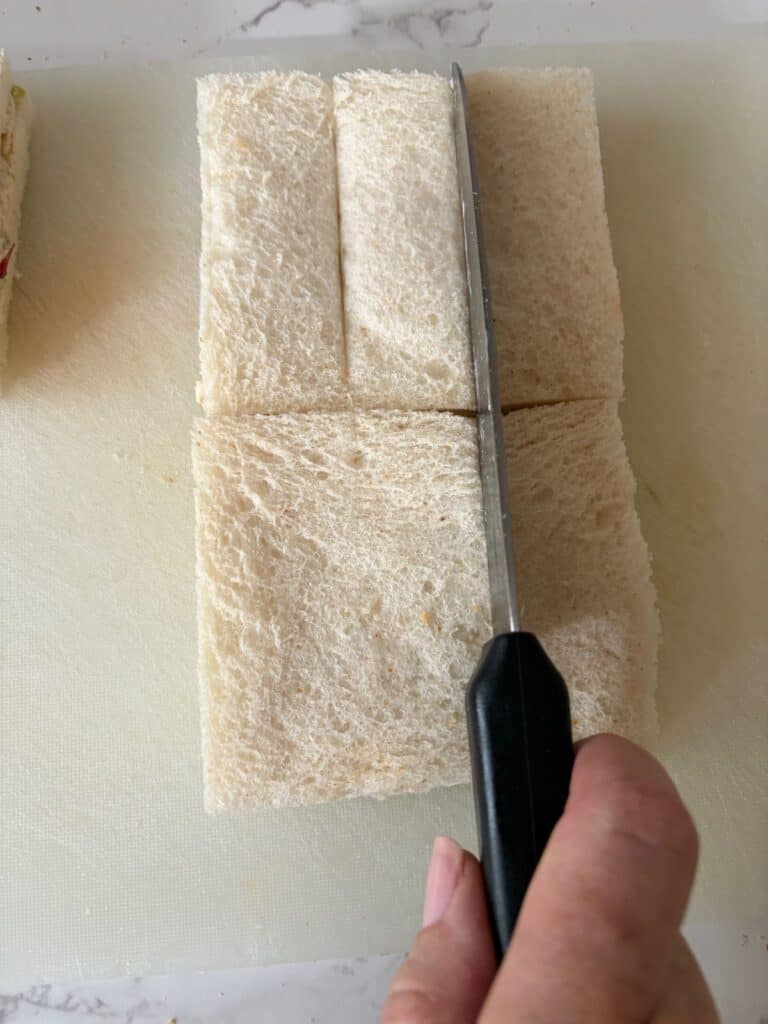 Score the sandwiches