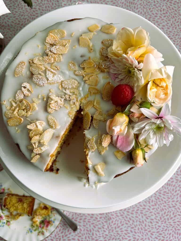 Top down view of raspberry, lemon and almond cake