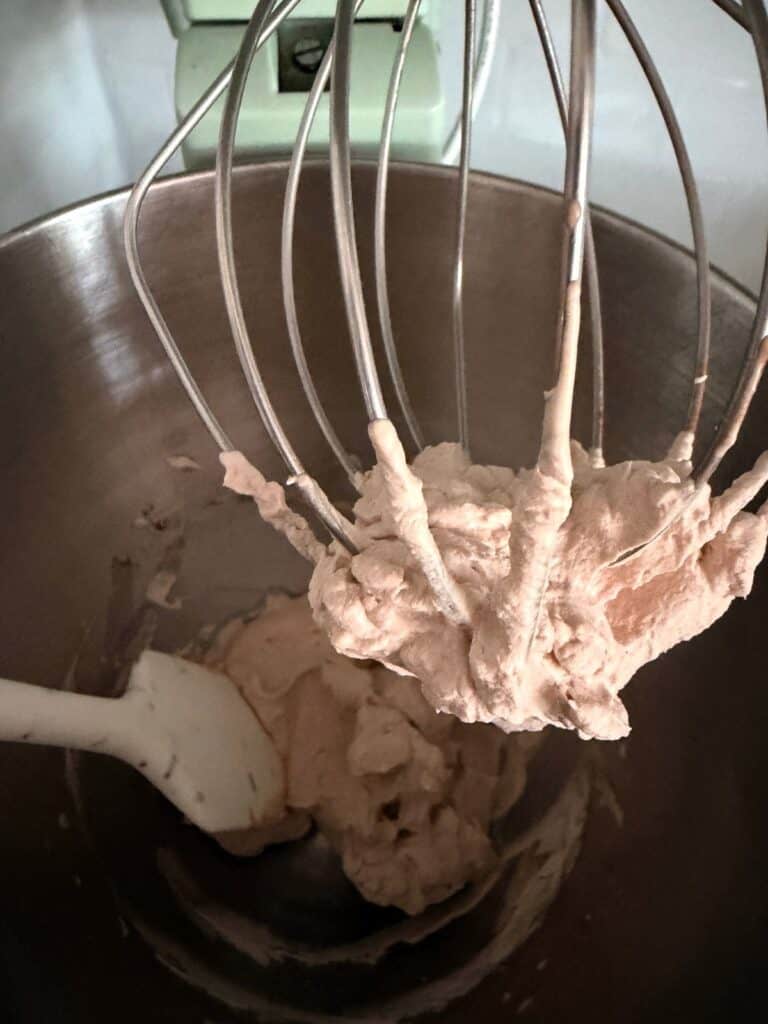 chocolate chantilly cream on a whisk