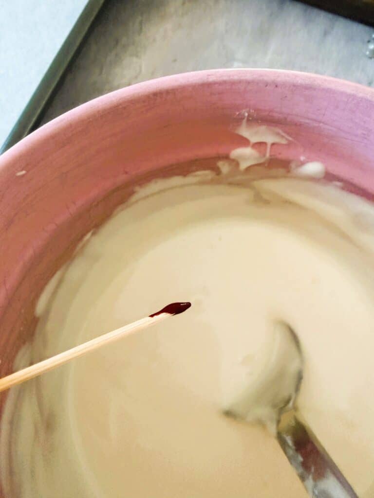 Add a little colour to melted white chocolate