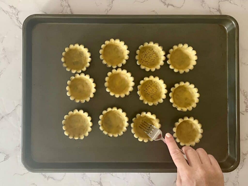 Dock the tart shells